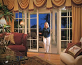 Retractable screen for sliding doors. Phantom Screens.